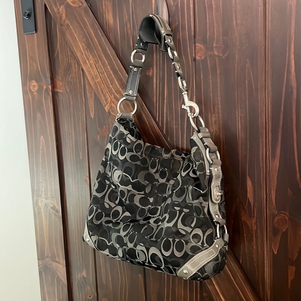 Black and gray coach purse